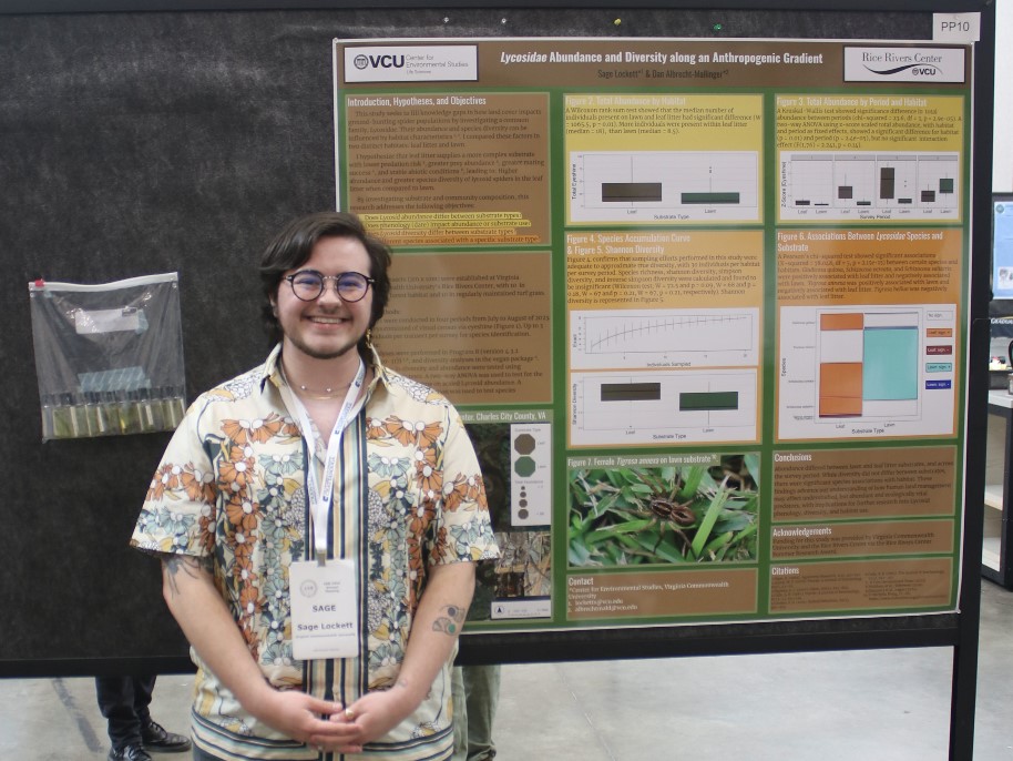 Sage Lockett standing in front of his poster presentation